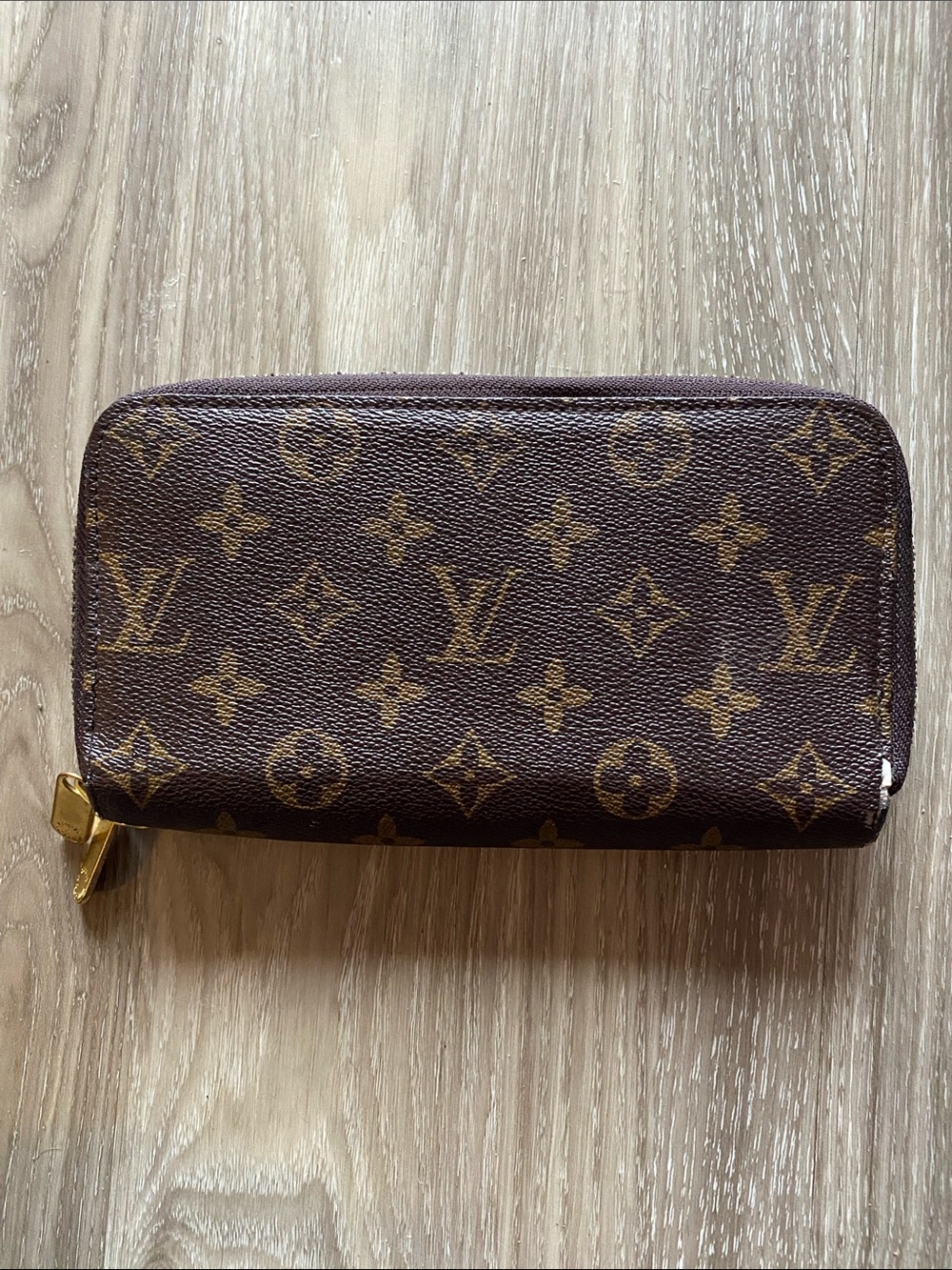 Luis Vuitton Dual Pocket Zippy Wallet in Brown Monogram Print With Gold Hardware